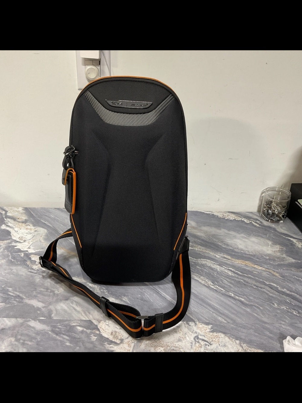 Tumi McLaren Torque 14" Sling  Carbon Fiber Crossbody Bag Black/Orange